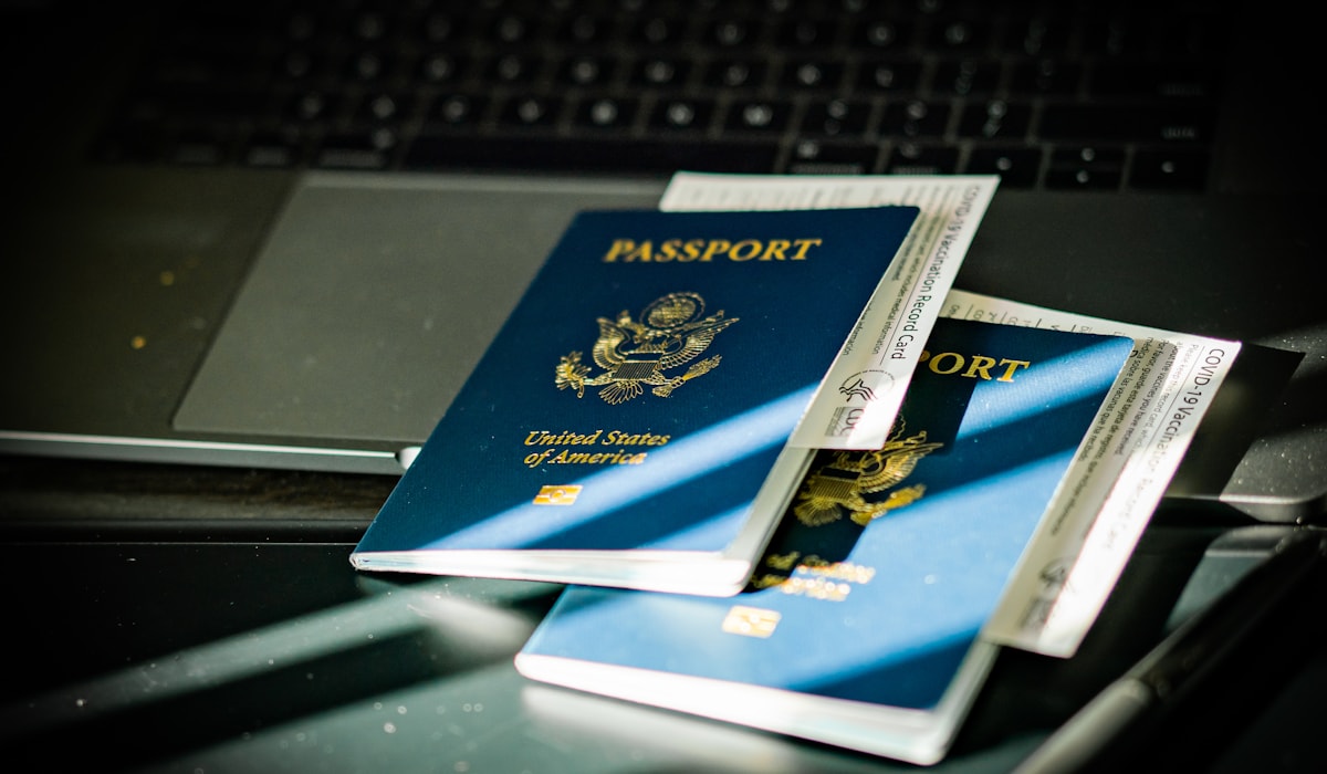 Passport and laptop used to illustrate casino withdrawal verification